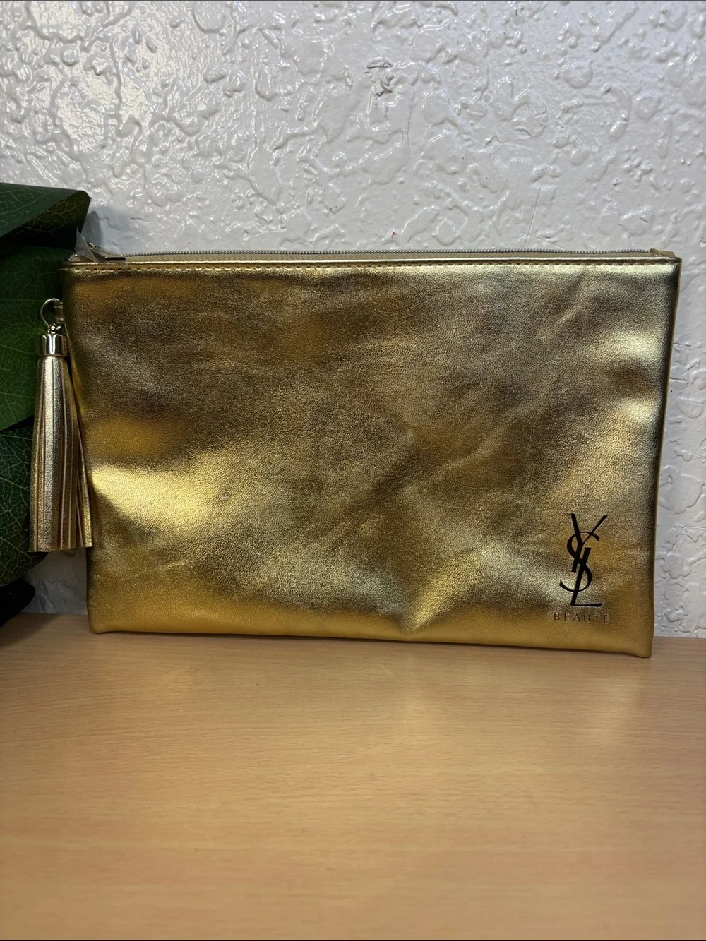 Yves Saint Laurent Metallic Gold Tassel Zip Pouch
